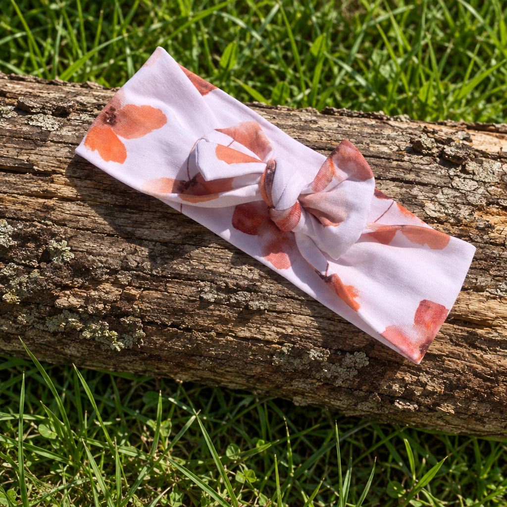  Bandeau cheveux Le Rétro Imprimé Floral Corail - 95% Coton Bio GOTS 5% Élasthanne - posé sur bois - MALOU au Fil des Saisons